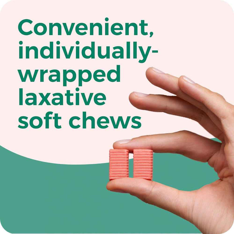 Hand holding pink laxative soft chews with text on a green background