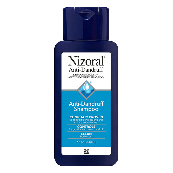 Nizoral Anti-Dandruff Shampoo with 1% Ketoconazole, Fresh Scent, 7 Fl Oz Bottle In Front Of White Background