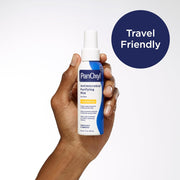A hand holds a bottle of PanOxyl Antimicrobial Purifying Mist against a light gray background, with a dark blue circular badge in the top right that reads 'Travel Friendly'.