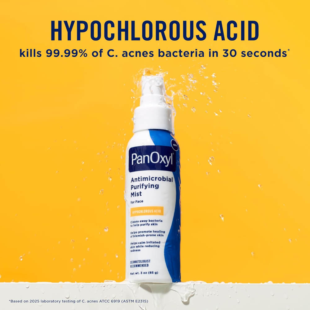 PanOxyl Hypochlorous Acid Antimicrobial Purifying Mist bottle on a bright yellow background with water splash graphics and text stating it kills 99.99% of C.