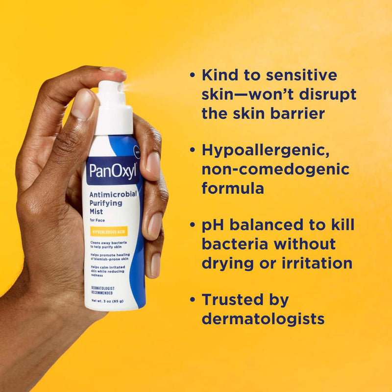A hand holding a bottle of PanOxyl Antimicrobial Purifying Mist against a bright yellow background with marketing text on the right.