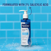 PanOxyl Acne Gel Wash bottle with a pump sits amid suds against blue bathroom tiles. Text highlights 2% salicylic acid, conveying a clean, clinical skincare feel.