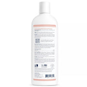 Back view of a white Veterinary Formula Clinical Care medicated hot spot shampoo bottle with a dense product label, QR code, and barcode, standing against a plain white background; clean, clinical feel.