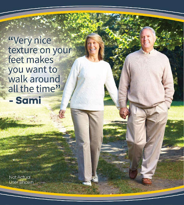 Dr. Scholl's Pain Relief Orthotics For Sore Soles - Two older people holding hands and walking freely whilst smiling