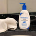 Vanicream Gentle Facial Cleanser 8 oz bottle sitting next to a sink in front of a white towel
