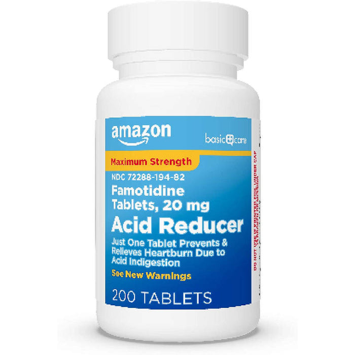 Amazon Basic Care 20mg Famotidine Tables inner product bottle in front of white background.